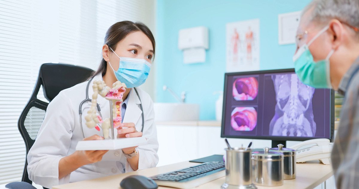 Asian,Female,Doctor,Wearing,Face,Mask,Is,Showing,A,Model